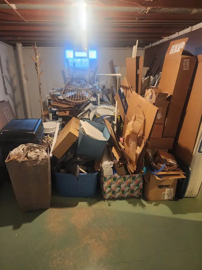 Roll-off dumpster container at job site for Yard Waste Dumpster Rental in Center